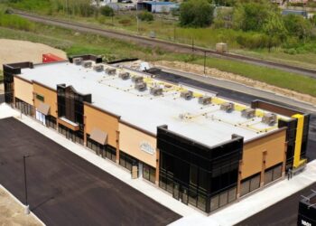 Preparing Flat Industrial Roofs For Winter At Commercial Buildings