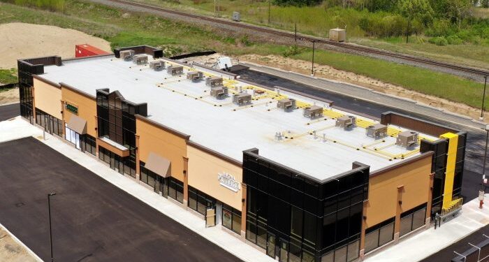 Preparing Flat Industrial Roofs For Winter At Commercial Buildings